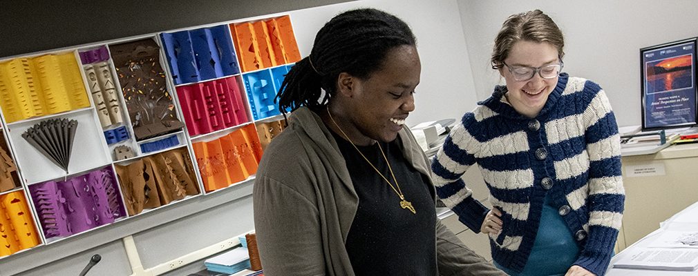 2 students working in the book arts studio