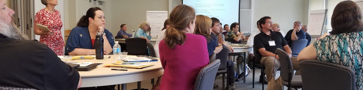 Participants listen to a presentation. Participants listen to a presentation.