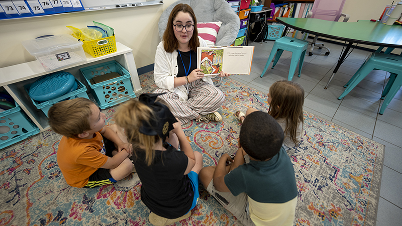 student Avery Morrell observes and engages with Patricia A. Duran Elementary school teacher Julie Zucchi's classroom as part of her academic program to become a teacher.