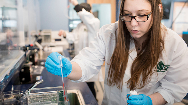 student in a lab setting