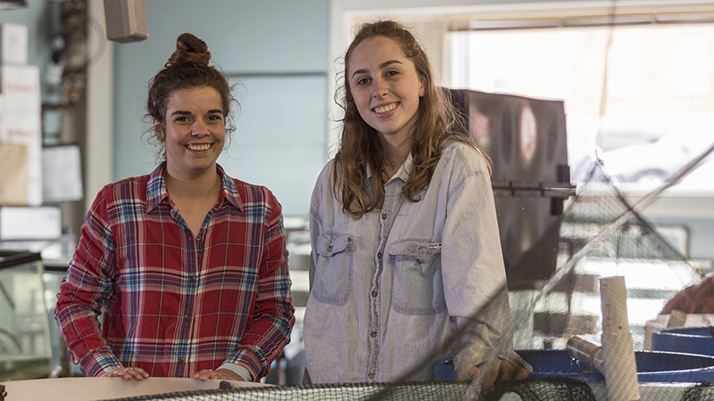 Two marine science students posing for photo