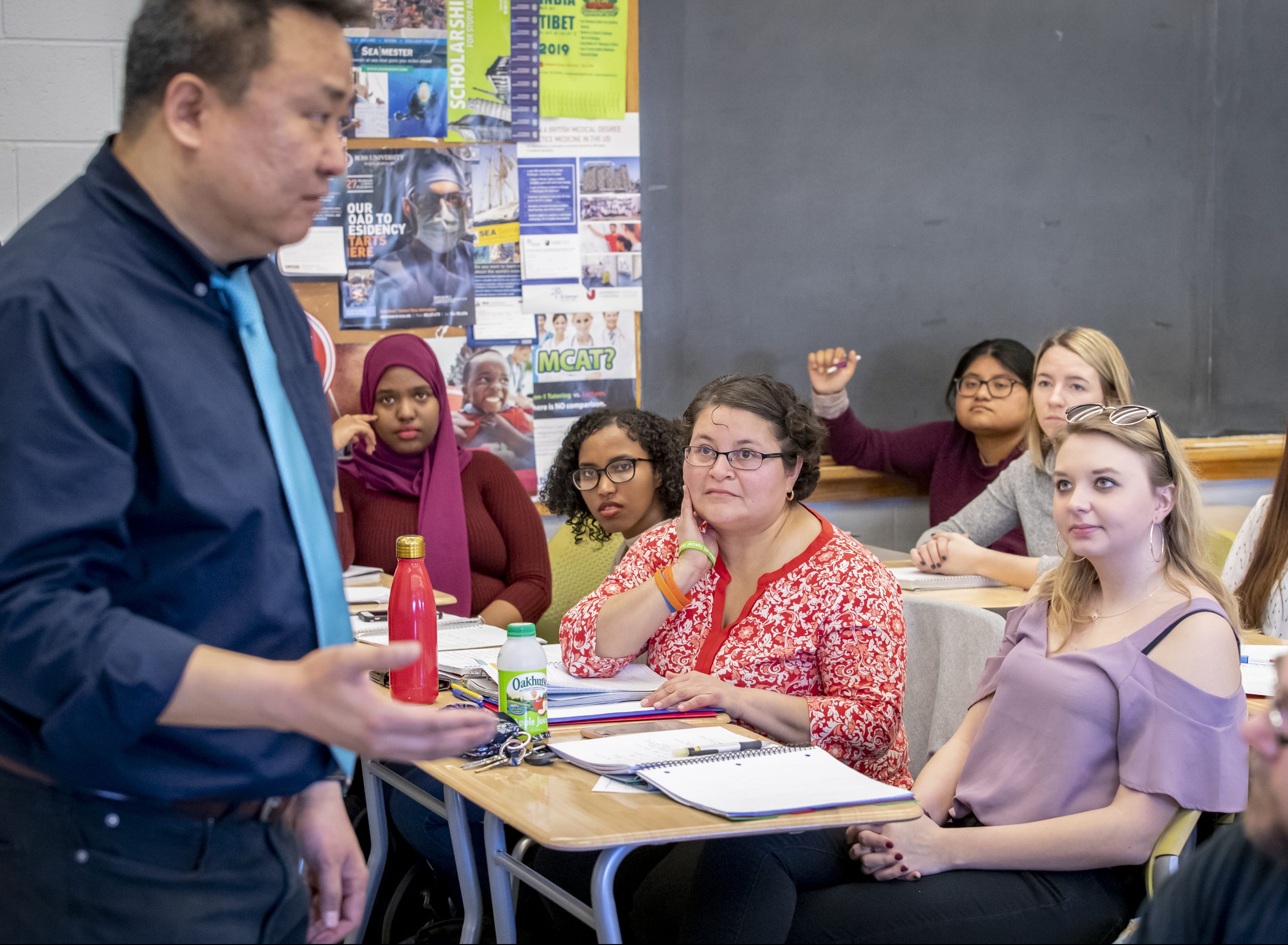 faculty teaching busy classroom
