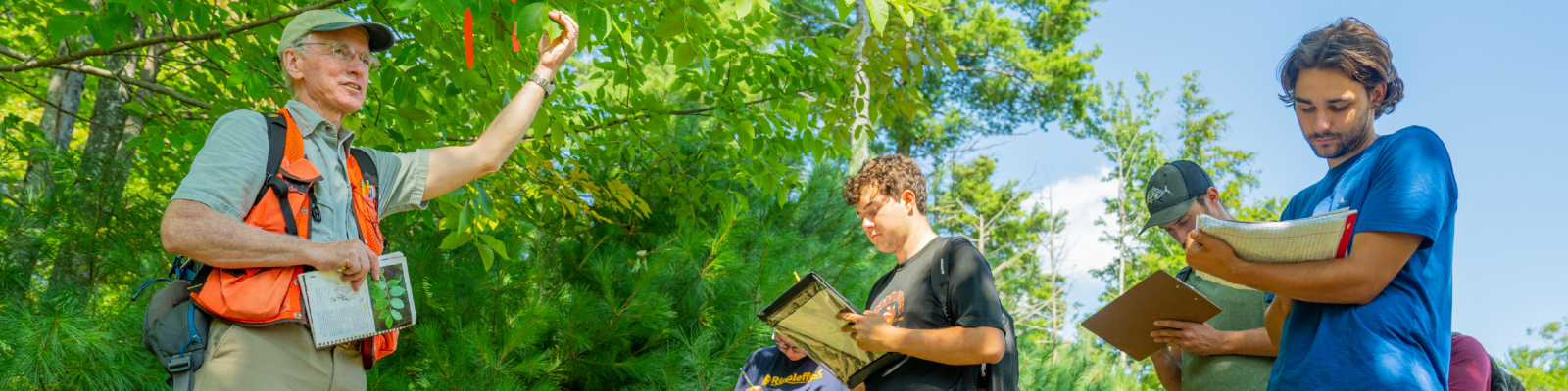 Students outside learning about forestry.