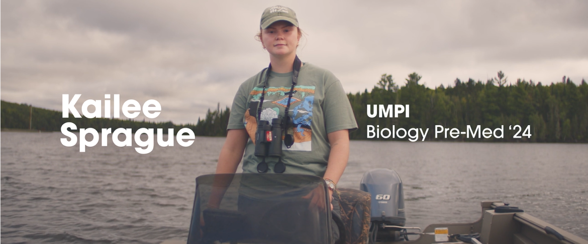 Kailee Sprague piloting boat